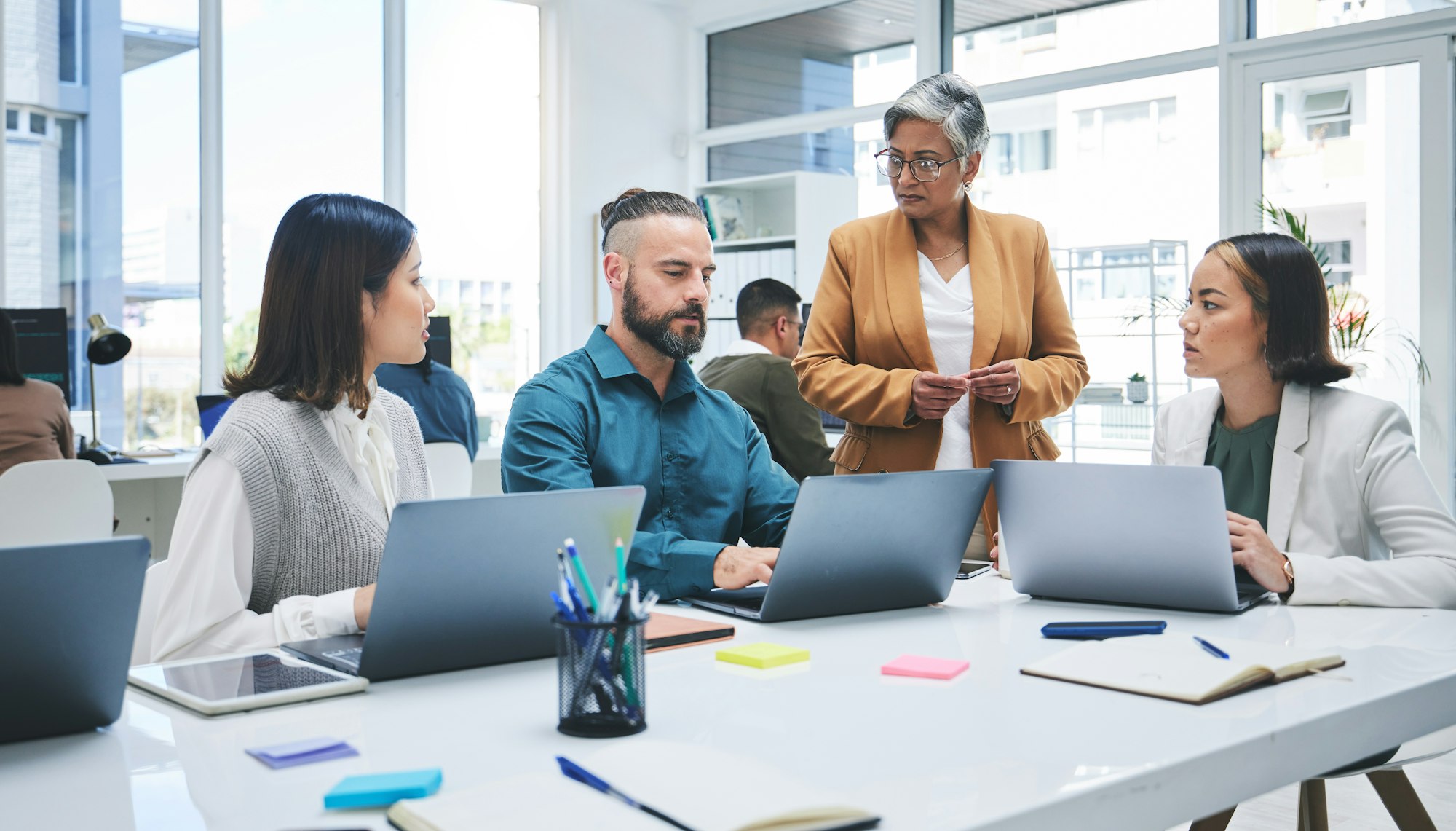 business-people-laptop-and-meeting-marketing-team-at-digital-agency-creative-digimarksite